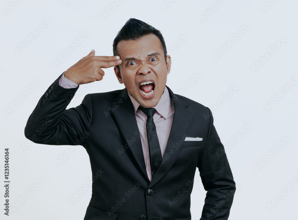 Wall mural Angry Asian boss manager businessman in black suit, isolated over white background.