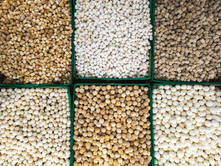 Qurut in boxes on the counter of an Asian market