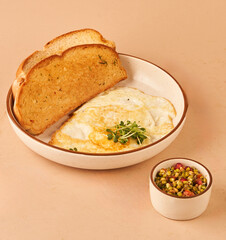bread and omelette in white plate for restaurant menu