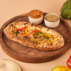crispy garlic base bread topped with mozzarella fresh vegetables 