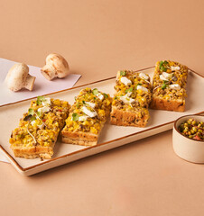 Focaccia Topped With Creamy Corn, Mushrooms, And Melted Cheese for restaurant menu
