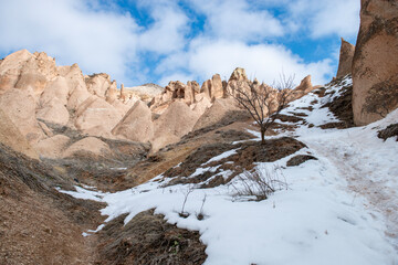 Rock formations of the Red Valley (Valley of Roses), Cappadocia, Turkey , in winter.