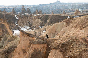 Rock formations of the Red Valley (Valley of Roses), Cappadocia, Turkey , in winter.