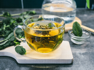 Chinese Tea Flower Bud Blooming in Glass tea cup