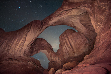 Double Arch in Arches National Park located in Utah, USA. Majestic rock formations arch against a...