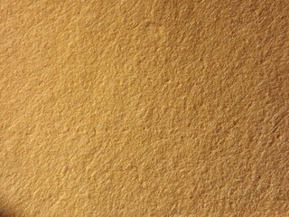 The textured surface is brown, red in color as a background. Felt. High quality photo