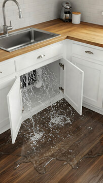 Leaking pipe under kitchen sink. Troubleshooting concept, accident, flood, plumbing, services, home maintenance, emergency service, flood, water splash, problem solving, neighbors, outrage