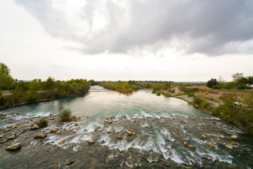 Seljuk bridge in Aspendos. The Eurymedon Bridge. Aspendos Yolu Belkis Mevkii. Turkey. Crooked...
