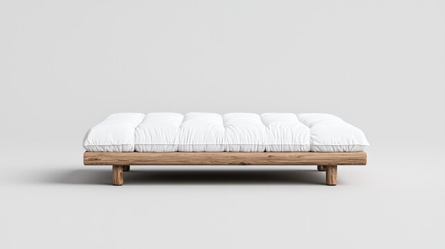 White futon bed on wooden frame, minimalist bedroom setting