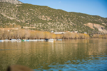 Decorated day-trip boats in Isikli Lake in Denizli's Civril district. Isıkli Lake is flooded with visitors during lotus time. It is also a popular lake for hunters.
