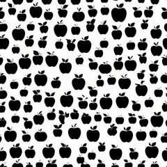 Fototapeta premium A repeating pattern of black apple silhouettes on a white background. The apples vary slightly in size, creating a playful, textured effect.