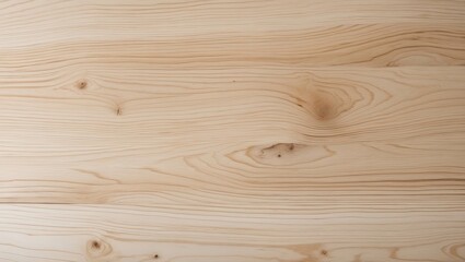 Fototapeta premium close-up of a wooden surface. The wood appears to be light in color and has a smooth texture. The grain of the wood is visible, with visible knots and grooves.