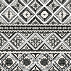 Beautiful seamless pattern handmade ikat art.folk embroidery and Mexican style. Aztec geometric art ornament print. photo mandalas pattern and Background concept.