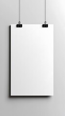 A blank poster hanging on a wall, ready for display or presentation.