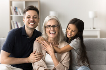 All together. Bonding friendly relatives dynasty mature mom grandma grownup son father preteen age...