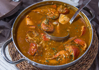 A dish of lobster rice, typical of Spanish cuisine