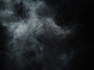Obraz premium Grey dust cloud explosion, dark background, studio shot, design element