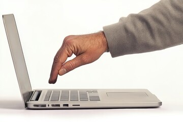 Hand Reaching Toward Laptop Keyboard in Neutral Setting for Technology Concept