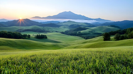 Obraz premium Sunrise over rolling green hills and mountains. Peaceful landscape for travel brochures (1)