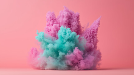 Fototapeta premium Soft pink and teal smoke clouds swirl on a pastel pink background, creating a dreamy, artistic atmosphere.