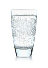 Refreshing soda water in glass isolated on white