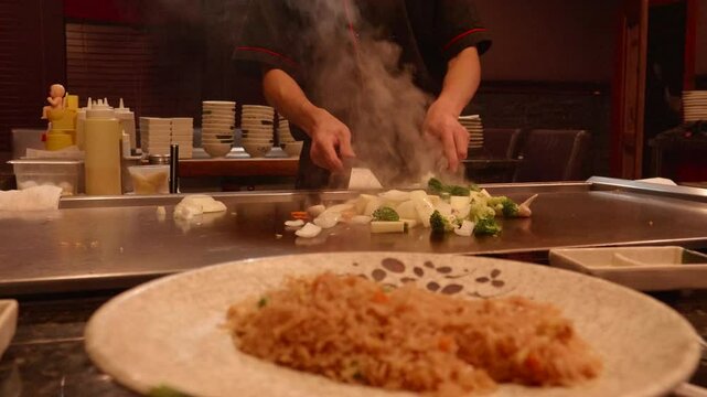 Teppanyaki Chef Making A Onion Volcano Fire2