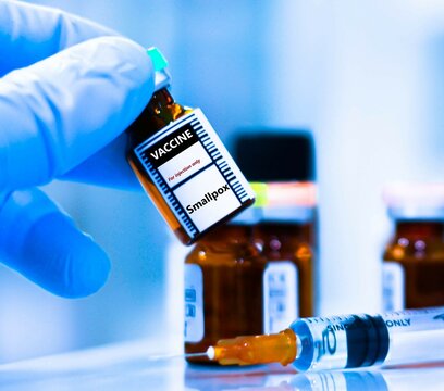 Vaccine bottles and syringes for injection preventing smallpox virus.