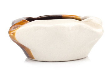Ceramic ashtray isolated on white background