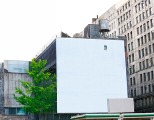 Obraz premium Blank billboard in downtown urban setting. Generative fill.