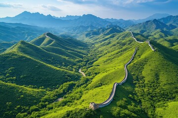 Scenic view of the Great Wall winding through lush green mountains during daytime