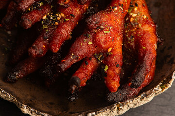 Caramelized korean or Chinese chicken foots ( paws ) with furikake