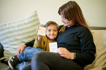 Flash cards, kid portrait and mother with education and emotional development with a child...
