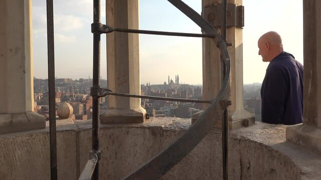 Cairo, Egypt A skyline view of downtown and Old Cairo from atop a minaret at the Ibn Tulun Mosque.
