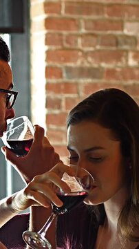 Couple drinking red wine