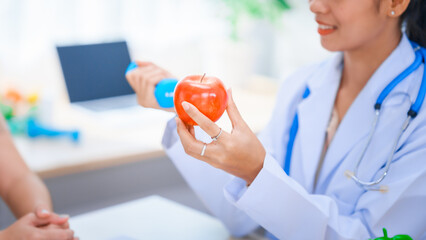 Female Asian nutritionist providing consultations for weight loss. reduce belly fat, offering...