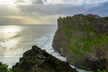 Beautiful sunset scenery of Uluwatu cliff in Bali, Indonesia