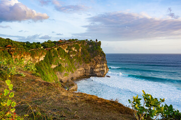 Beautiful sunset scenery of Uluwatu cliff in Bali, Indonesia