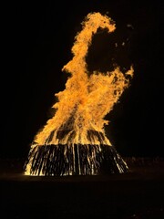Large bonfire in the night sky