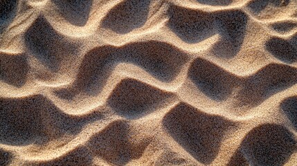 Rippled beach sand texture, sunlight, background