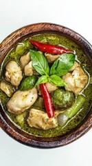 Green Curry Chicken with Fresh Herbs and Spicy Peppers Dish