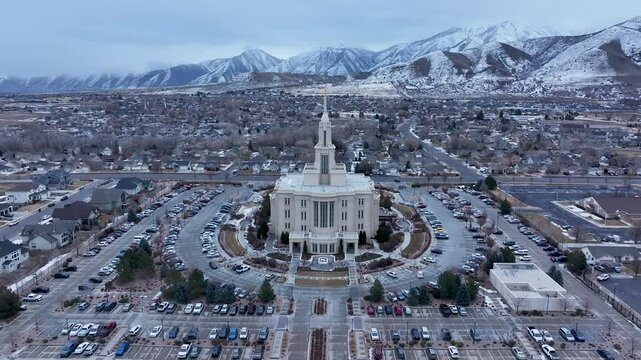Aerial Payson Utah LDS Temple mountain valley circle 2. The Church of Jesus Christ of Latter-day Saints, LDS or Mormon religion. Sacred building for eternal worship. Residential neighborhood.
