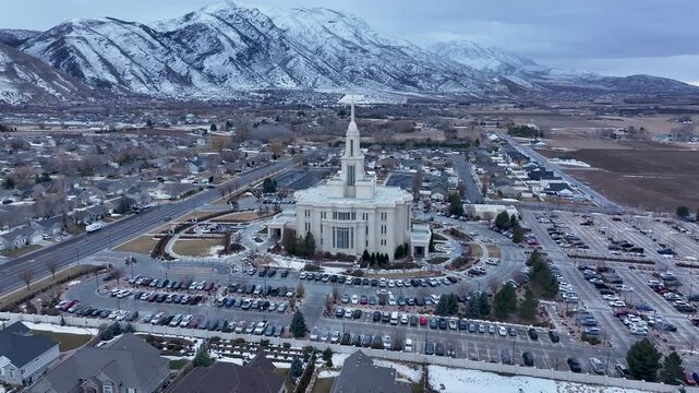 Aerial Payson Utah LDS Temple mountain valley circle 1. The Church of Jesus Christ of Latter-day Saints, LDS or Mormon religion. Sacred building for eternal worship. Residential neighborhood.