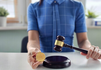 Judge in courtroom with gavel and cryptocurrency bitcoin during trial concept