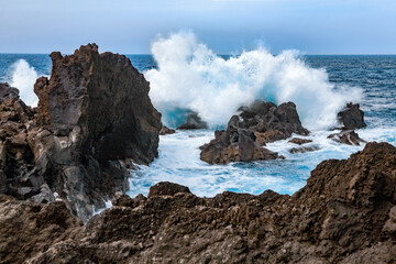 Waves crashing on the volcanic cliffs, Island Lanzarote, Canary Islands, Spain, Europe.