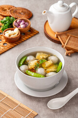 Fish Ball Soup with Fish belly crackers are called hipio
