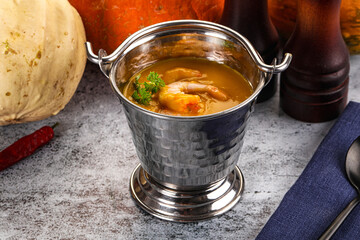 Pumpkin cream soup with prawns