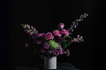 Purple and Pink Floral Arrangement in Moody Light