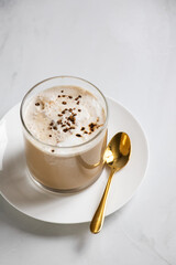 affogato in a glass with sprinkle of coffee on top