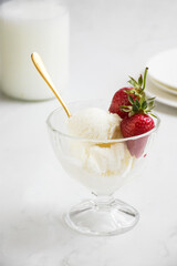 Vanilla ice cream with a touch of strawberry