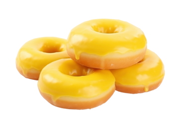 a group of donuts with yellow frosting